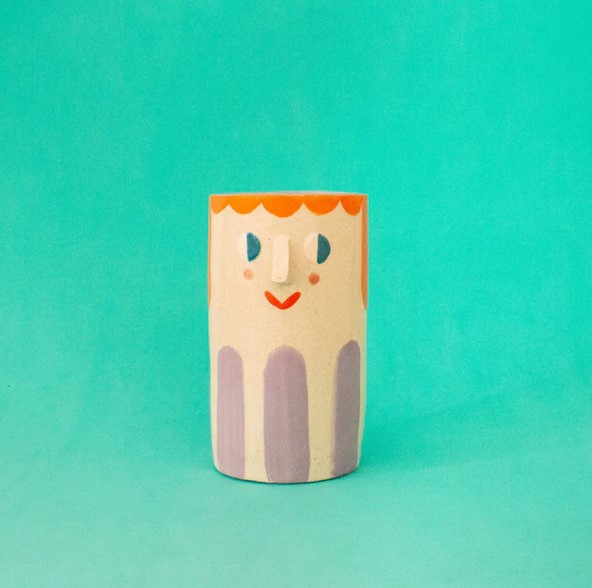 Girl with purple stripes vase